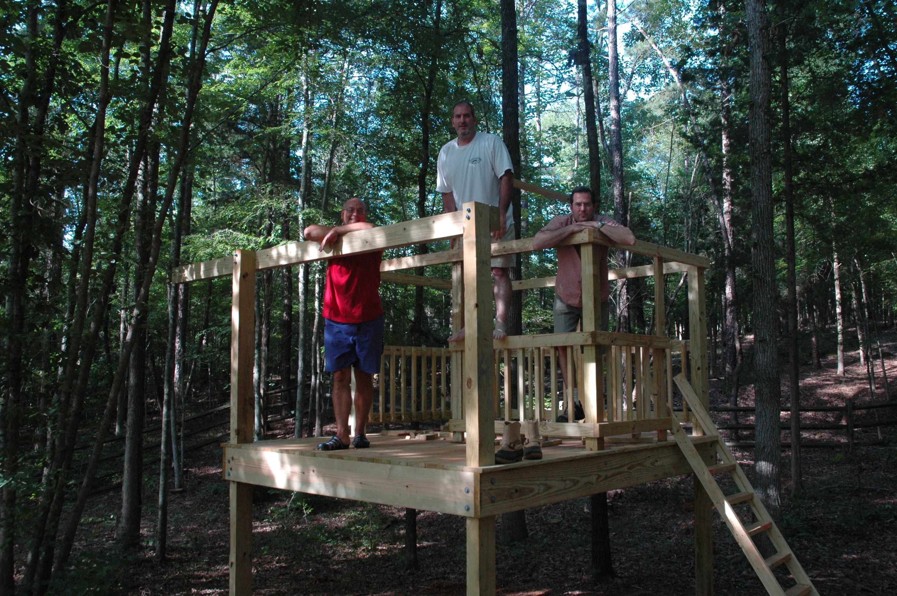 Three Builders Climbing